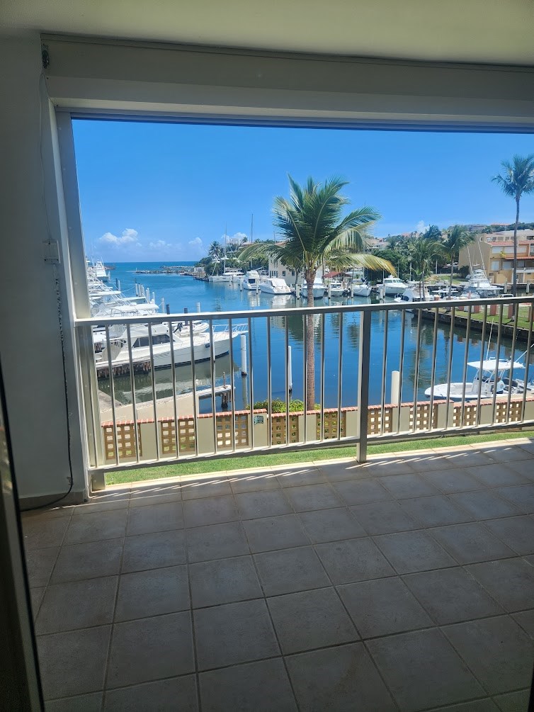 formal living and dining room enjoy this spacious terrace with views to the harbour and caribbean sea
